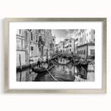 Extra large abstract art print of a textured Venice scenery in muted earth tones, framed with a silver mat.