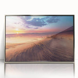 Large art print of a European Lithuanian landscape in muted greens and blues, framed in silver acrylic.