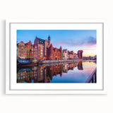 Textured abstract art print depicting a European scenery in muted earth tones, framed with a white mat.