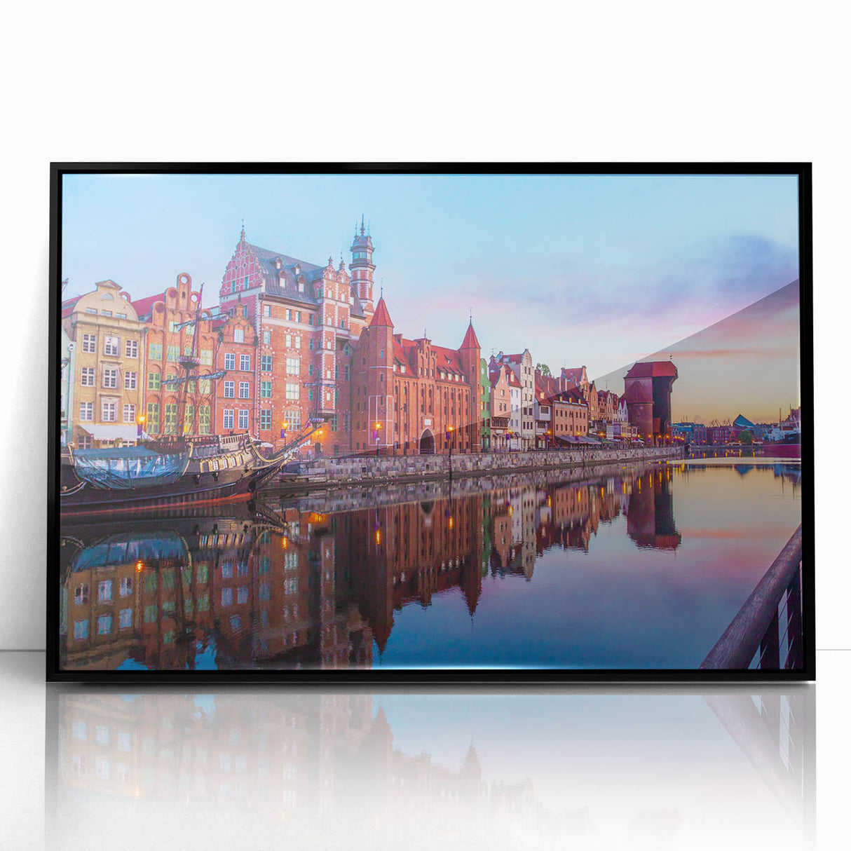 Large abstract wall art featuring a mid-century modernist design of a European cityscape in muted colors on a framed acrylic.