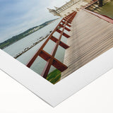 Art deco poster of Lisbon scenery in muted green and white, rolled canvas, suitable for dining room wall.