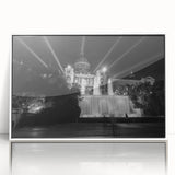 Mid-century modernist art depicting Barcelona skyline in muted blue tones on a white framed acrylic print.