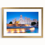 Extra large abstract art print of Madrid scenery in textured style, using muted earth tones, framed in gold.
