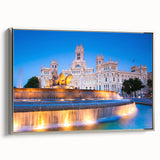 Landscape art painting of Madrid with colorful vintage poster art elements on black framed canvas.