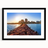 Abstract art print of colorful, textured scenery in Valencia, on a large black-framed canvas, ideal for living room decor.