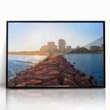 Large abstract wall art depicting a vivid, colorful cityscape of Valencia, Spain on a black framed acrylic print.