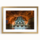 Extra large abstract art print of Stockholm scenery in muted blue and gray tones on a gold-framed canvas.