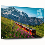 Acrylic glass print of a serene Swiss landscape, featuring soft blues and greens, ideal for bedroom or dining room decor.
