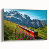 Framed canvas featuring a vintage-style landscape painting of a Swiss scenery in colorful tones.