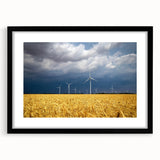 Abstract art print of vibrant, colorful scenery in extra large format, textured surface, framed in black.