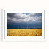 Abstract art print of a European scenery in muted earth tones on a framed white mat, suitable for dining room decor.