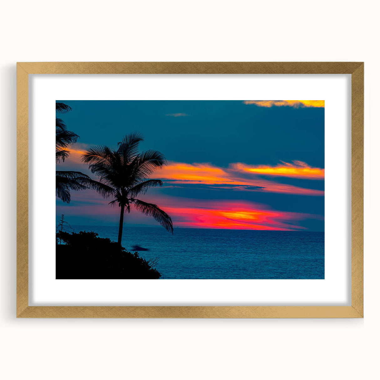 Extra large abstract art print featuring textured scenery of Acapulco, in muted earth tones, framed in gold.