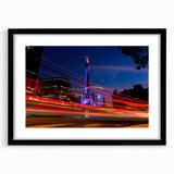 Extra large abstract art print of Mexico City in vibrant, colorful hues on a textured canvas, framed in black.