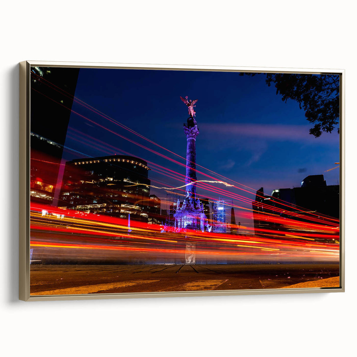 Framed canvas depicting a vintage-style landscape painting of Mexico City in muted gold and black tones.