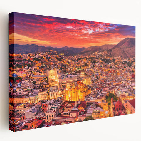 Side view of a stretched canvas featuring a vibrant street scene in Guanajuato, Mexico, with colorful buildings.