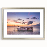 Textured art depicting an abstract scenery of Oaxaca in muted earth tones, presented in a silver frame with mat.