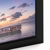 Black wall art depicting a textured scene of Oaxaca, Mexico in vibrant colors on a framed canvas.