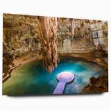 Large abstract depiction of Yucatan scenery, rendered in vibrant greens and blues on acrylic glass.