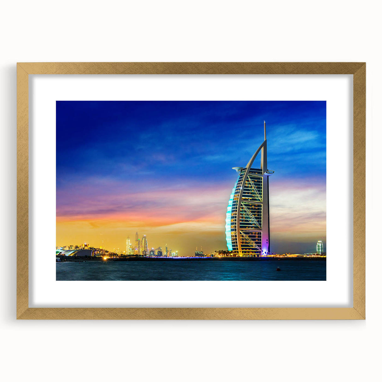 Extra large textured abstract art print of Dubai skyline in muted gold and blue tones, framed with a gold mat.