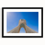 Abstract art print of a Middle Eastern scenery in vibrant colors on a textured, extra large canvas, framed in black.