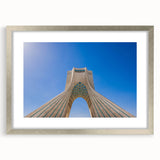 Textured abstract art print depicting a Middle Eastern scenery in muted earth tones on a framed canvas.