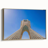 Framed canvas featuring a vintage-style landscape painting of a Middle Eastern scene in muted gold and black.