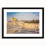 Abstract art print of Jerusalem in vibrant colors on a large framed canvas, ideal for living room decor.