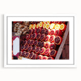 Abstract art print of Tel Aviv cityscape in muted blue and grey tones, framed with a white mat.