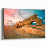 Framed canvas featuring a vintage-style landscape painting of a Middle Eastern scenery in muted earth tones.