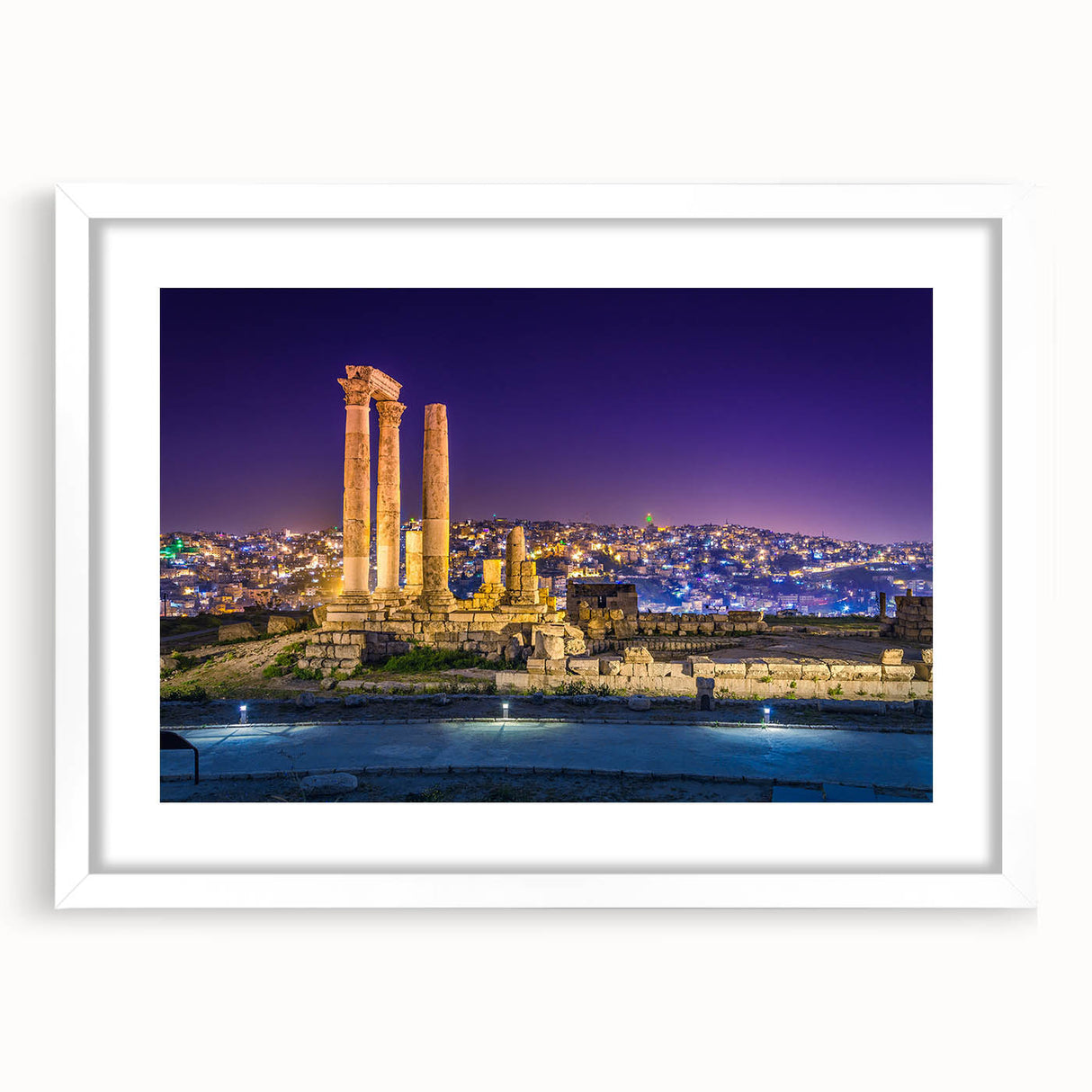 Abstract art print of a Middle Eastern landscape in muted earth tones on a framed white mat, suitable for dining room decor.