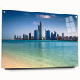 Large abstract wall art of Abu Dhabi skyline in muted blue and gray tones on acrylic glass.