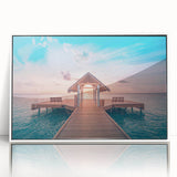 Acrylic print of Bora Bora scenery with pastel blue ocean and white sand, framed in white.