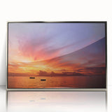 Mid-century modernist art depicting a serene Tahitian landscape in soft pastel colors on a silver-framed acrylic.