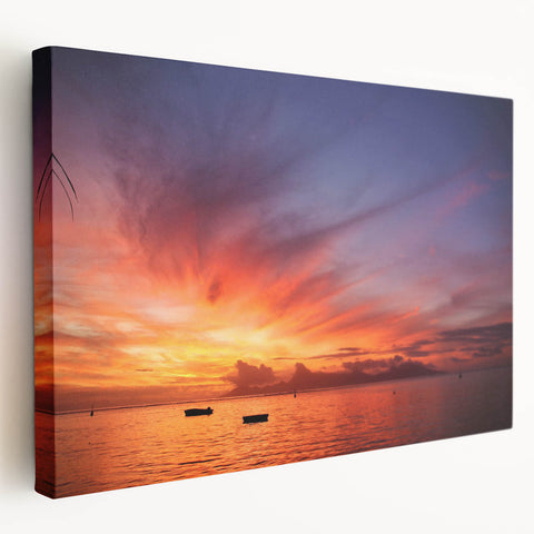 Large art print of a Tahitian coastline on stretched canvas, featuring vivid blue and green tones.
