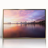 Large art print of Auckland skyline in muted gold and blue tones on a framed acrylic, suitable for modern art wall decor.