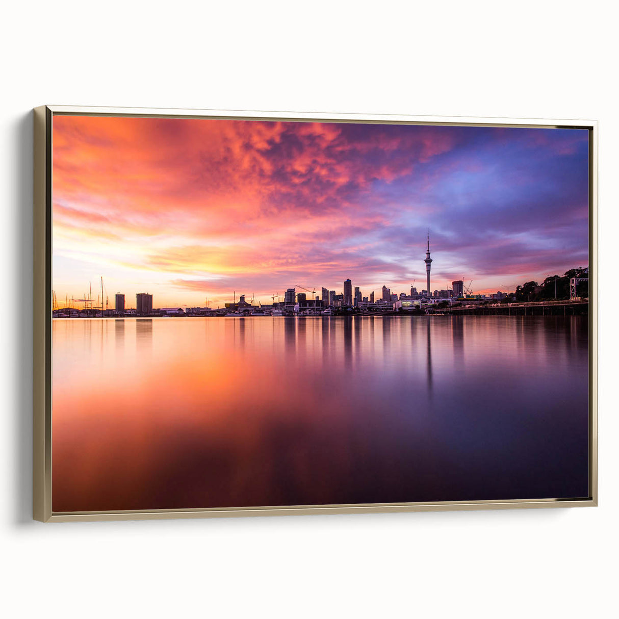 Framed canvas of Auckland landscape with black and gold tones, ideal for bedroom wall art.