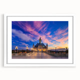 Abstract art print of Buenos Aires skyline in muted blue and gray tones, framed with a white mat.