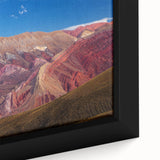 Extra large framed canvas featuring a textured black wall art of an abstract Argentine scenery in vibrant colors.