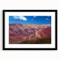 Extra large abstract art print of a colorful Argentine scenery in black frame, ideal for living room decor.