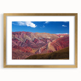 Extra large abstract art print of a textured Argentinian landscape in muted earth tones, framed in gold.