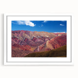 Abstract art print of Argentine scenery in muted earth tones on a white-framed canvas, ideal for dining room decor.