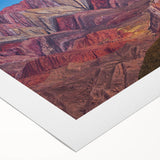 Art deco poster featuring a stylized Buenos Aires cityscape in muted blues and grays on rolled canvas.