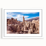Abstract art print of the Bolivian landscape, featuring earthy brown and green tones on a white framed canvas.