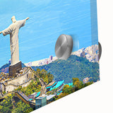 Large abstract wall art of a Brazilian landscape in vibrant green and blue tones on acrylic glass.