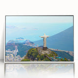 Art deco poster of a Brazilian landscape in muted green and blue tones, acrylic print framed in white.