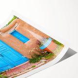 Extra large wall art featuring line art flowers over a muted Santiago, Chile scenery on a rolled print.