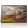 Acrylic print of a large abstract wall art depicting a colorful Colombian landscape, framed in black.