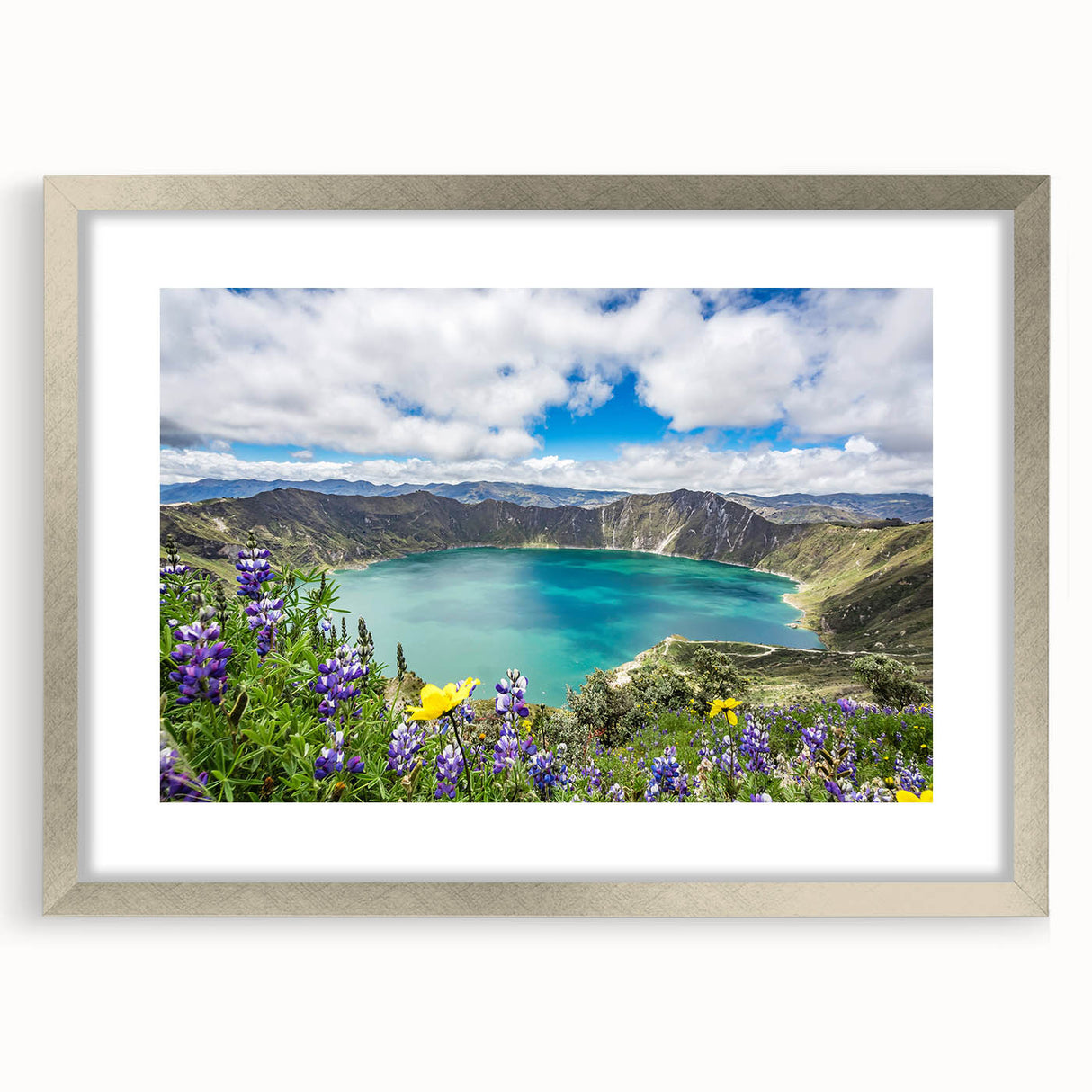 Textured abstract art print depicting a South American scenery in muted earth tones, framed in silver.
