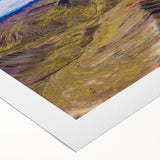 Art deco poster featuring a stylized scene of Machu Picchu in muted earth tones on rolled canvas.