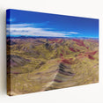 A stretched canvas print of a scenic Peruvian landscape, featuring earthy tones and a panoramic view.
